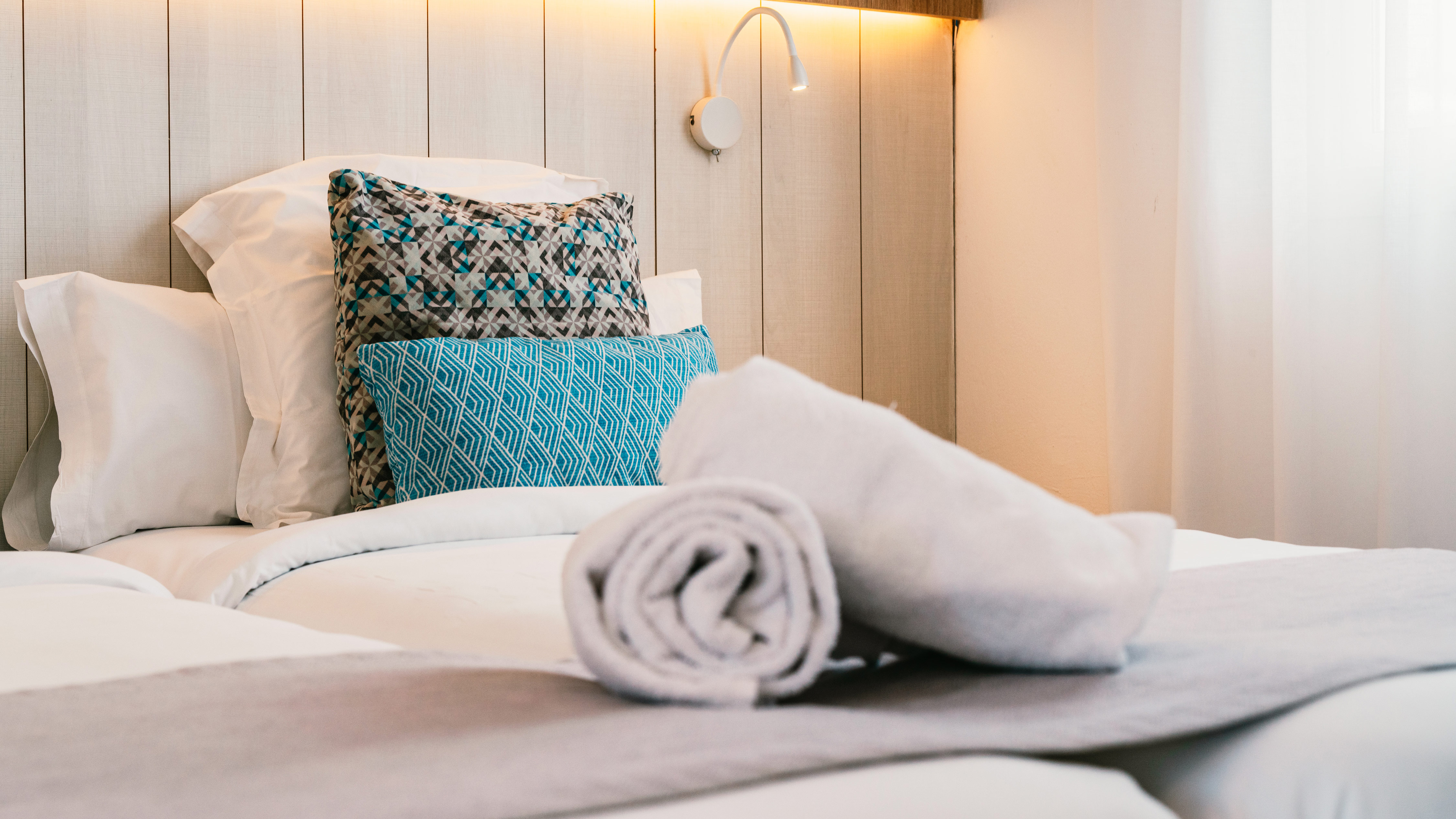 Closeup of bed in 1 Bedroom Suites at Alyssa Suite Hotel 