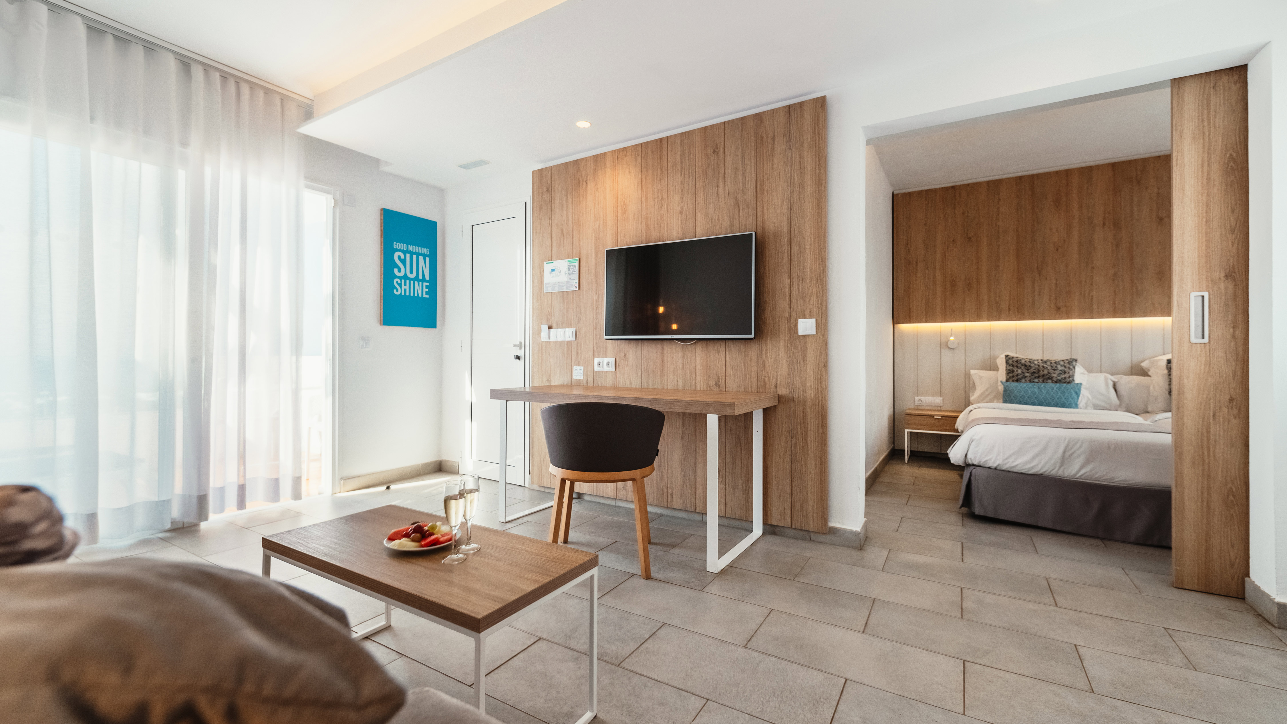 Bed & furniture in 1 Bedroom Suites at Alyssa Suite Hotel