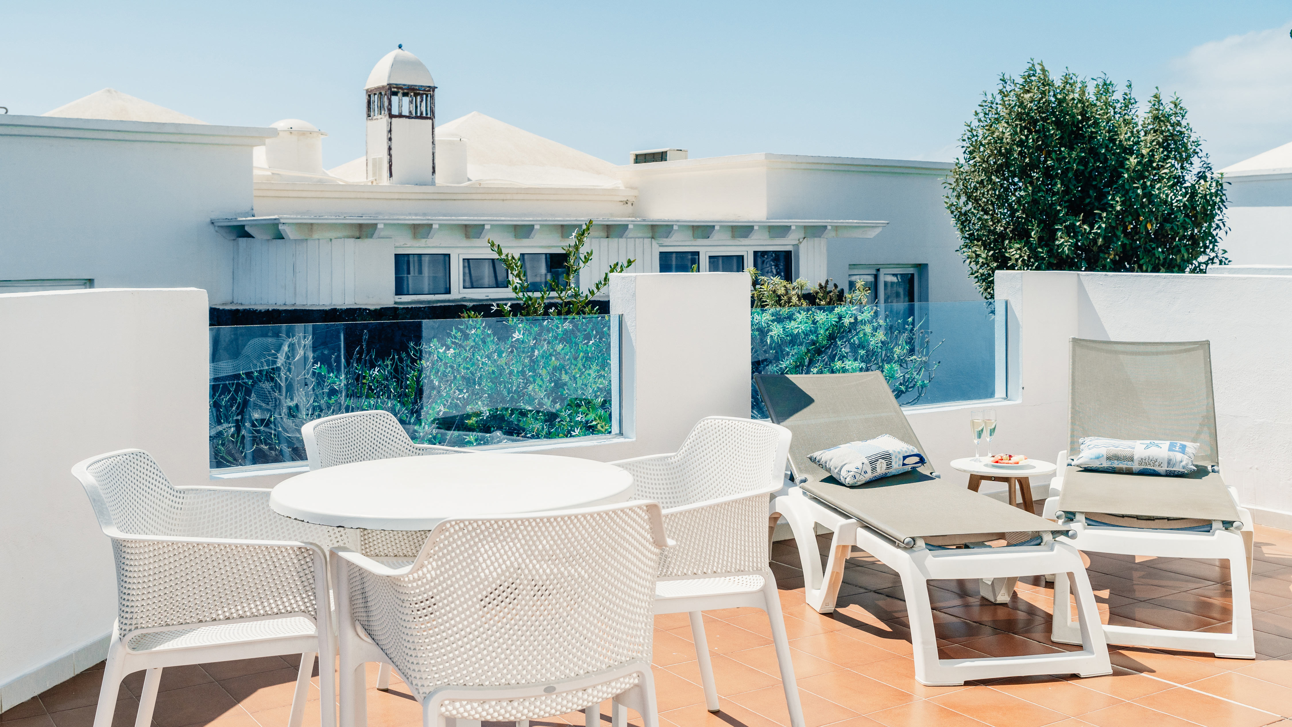 Bed & furniture in 1 Bedroom Suites at Alyssa Suite Hotel